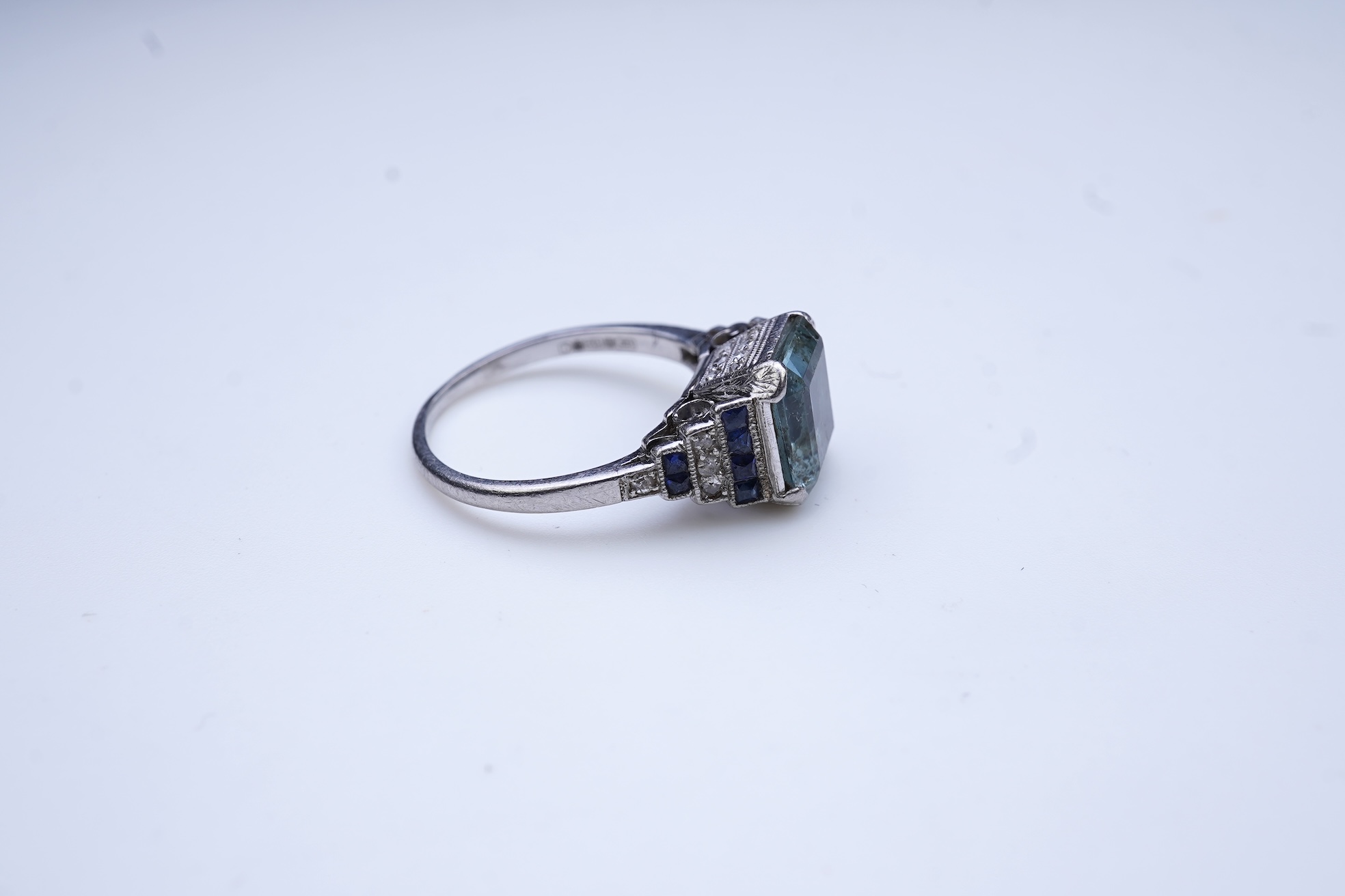 An aquamarine, sapphire and diamond ring